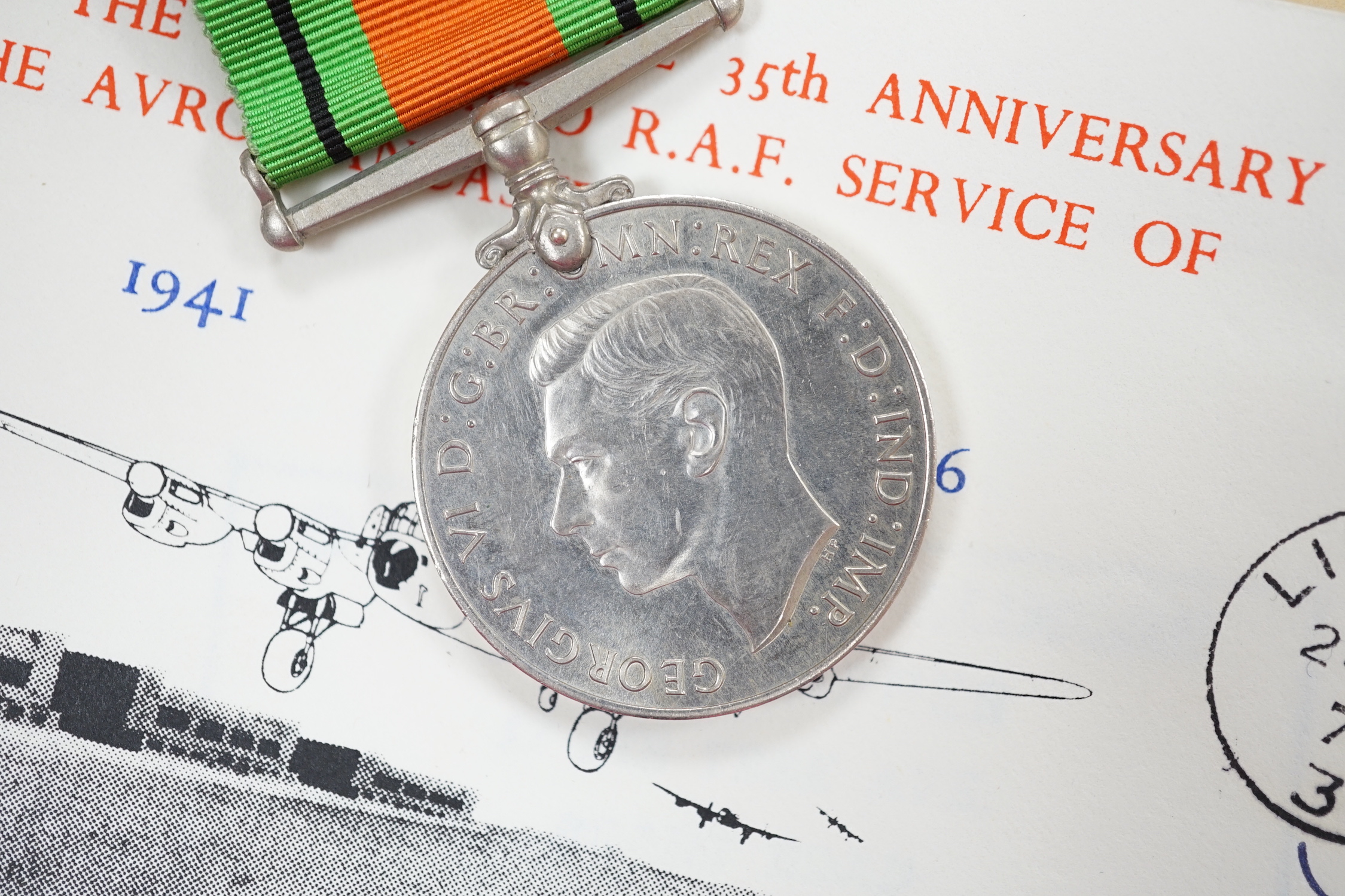 An RAF silver mug, and framed drawing of a map of Belgium and surrounding countries relating to 83rd Group Main HQ, Tactical Air Force 1944-45 together with four WWII medals in the original card, issue box; the Defence M